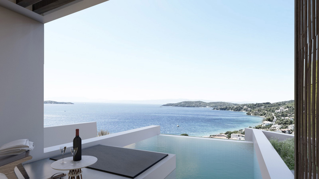 The breathtaking view of Megali Ammos Beach from our deluxe double's private pool